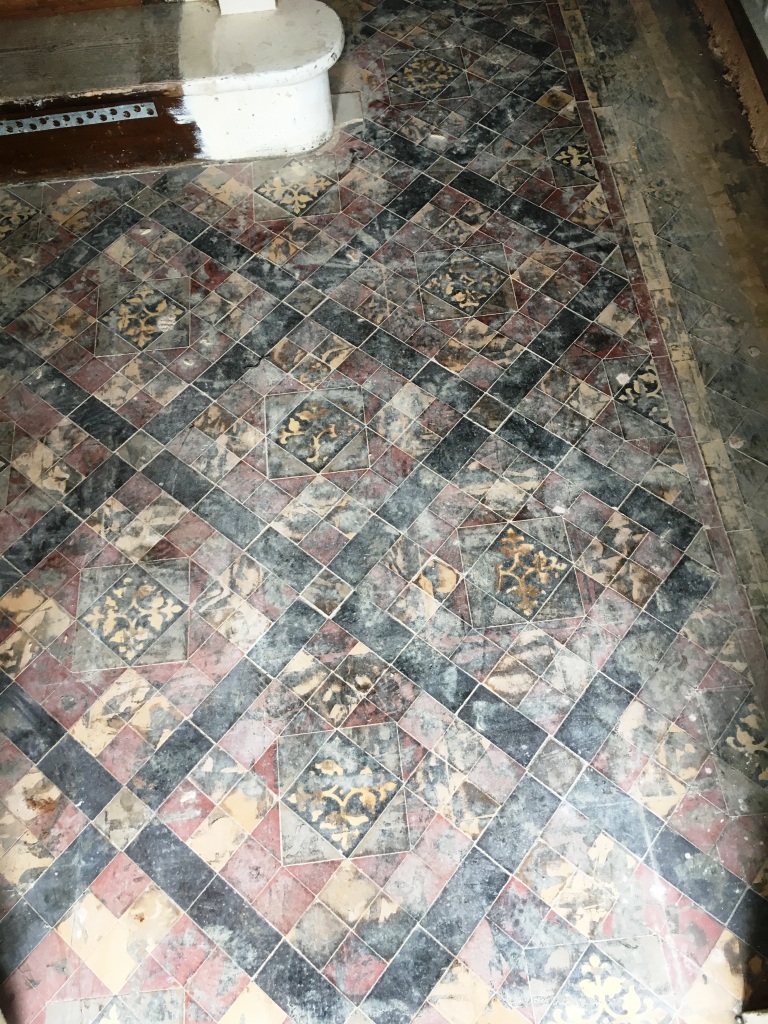 Edwardian Tiled Floor Covered In Tar Chaplefields Coventry Before Restoration