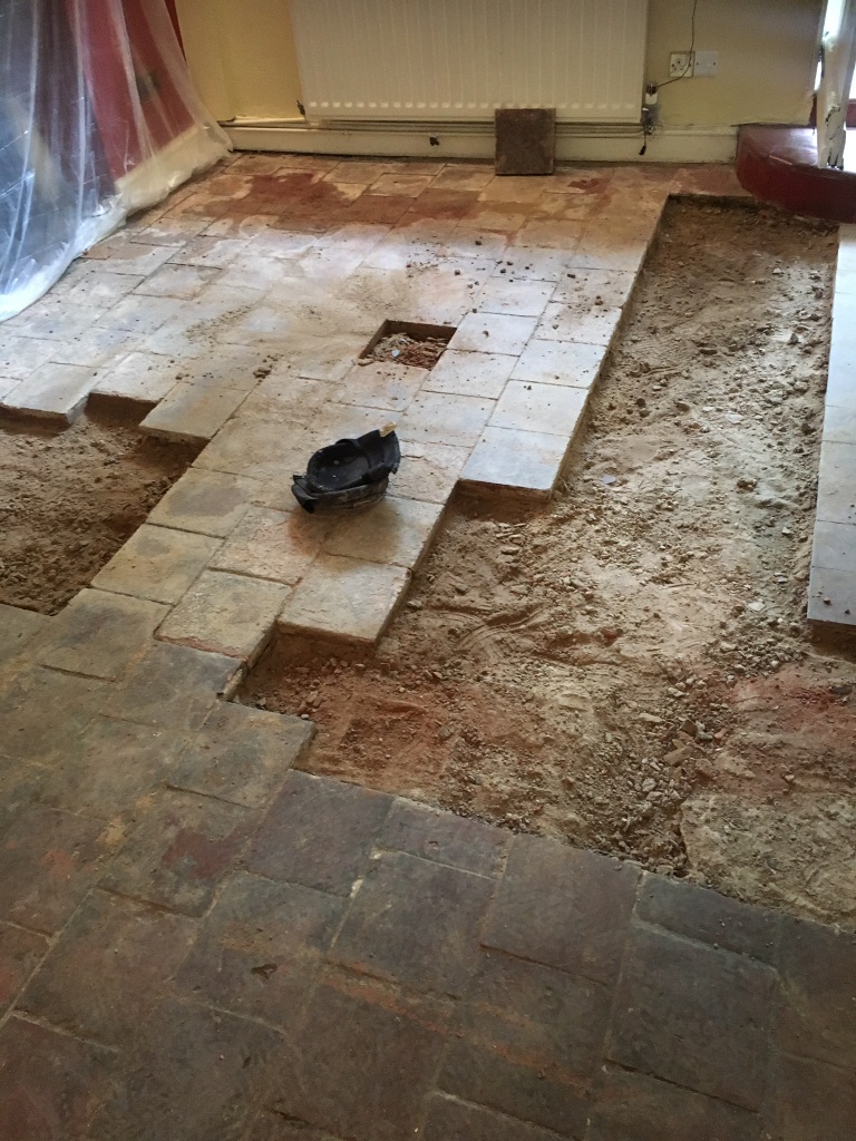 Quarry Tiled Floor Thatched Cottage in Rugby During Rebuild