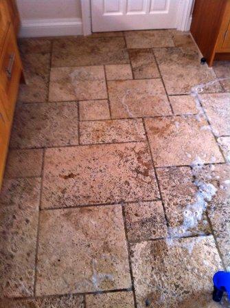 Dirty Travertine Floor During Washing